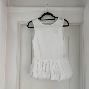 Sleeveless White Peplum Top
